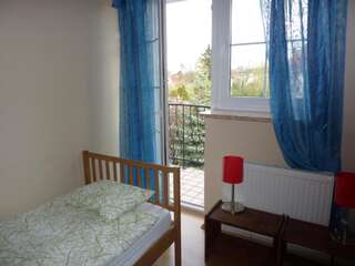 Проживание в семье Dandelion B&B Варшава Односпальная кровать в общем номере для мужчин и женщин-3